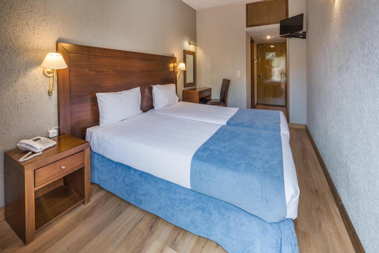 Arahova Inn Hotel Cameră foto